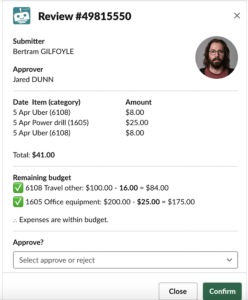 A chatbot message that asks an employee to approve or reject an expense request